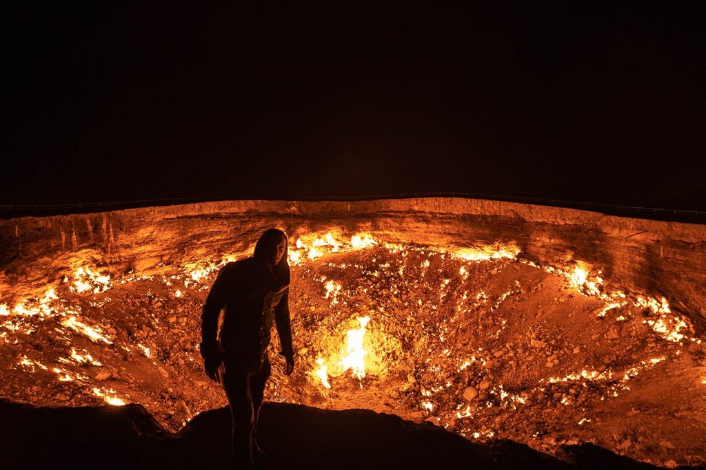 David Simpson and the gas crater in Darvaza, Turkmenistan. The gates of hell