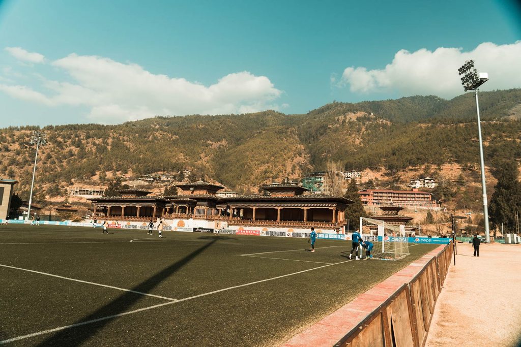 National Football Stadium in Bhutan. Wild dogs in Bhutan