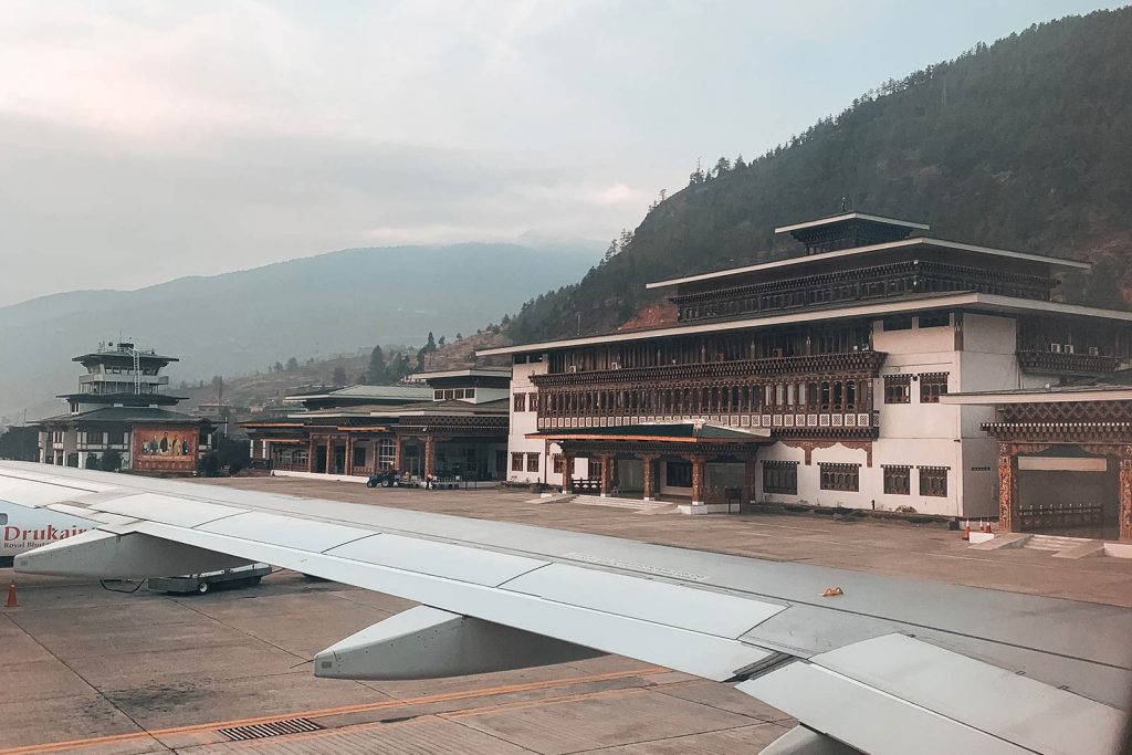 Paro International Airport in Bhutan. Wild dogs in Bhutan