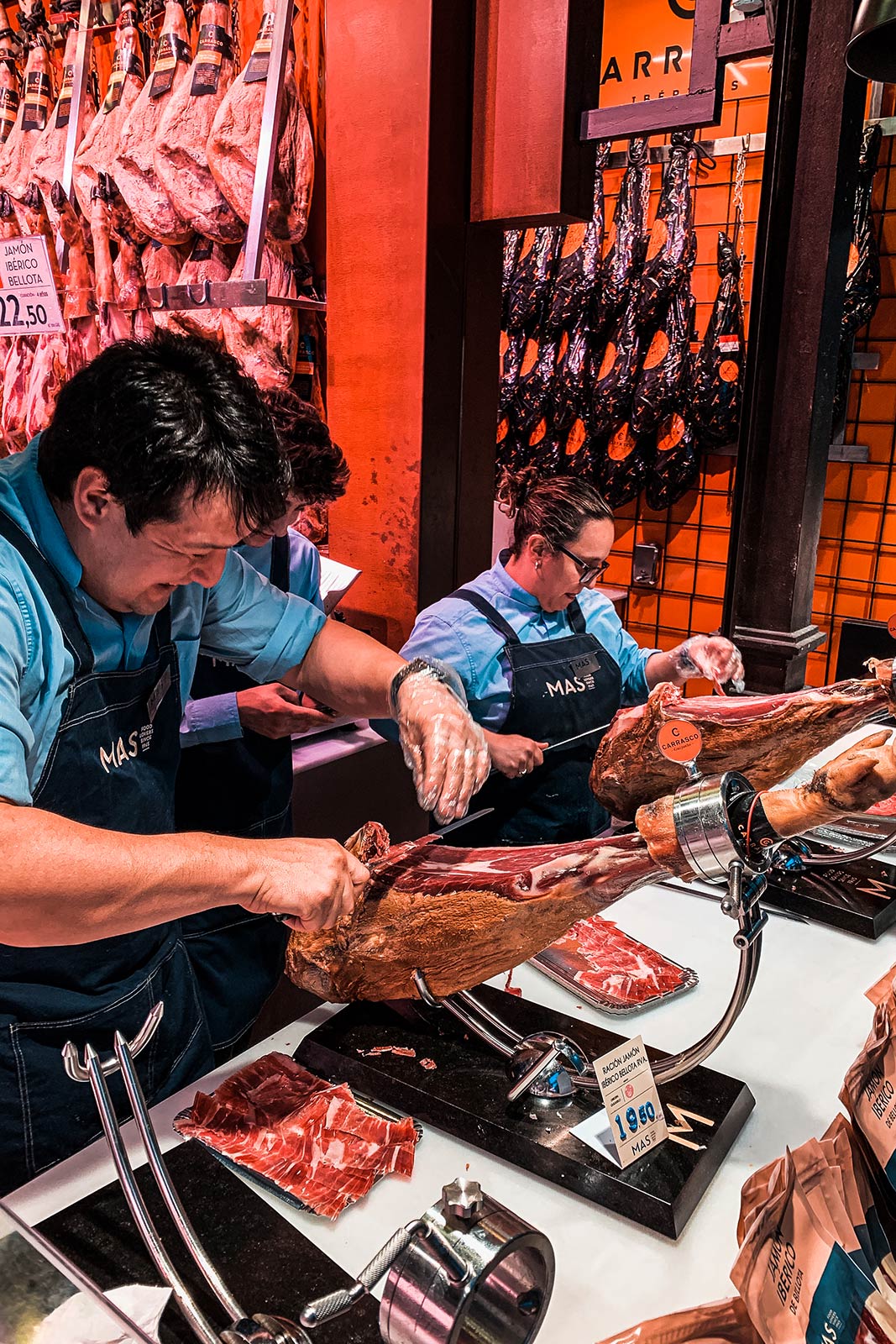Meat vendors at Mercado de San Miguel in Madrid, Spain. Mercado de San Miguel, Madrid