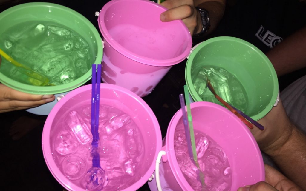 Drinks in a pail in Koh Tao, Thailand. Ladyboys, falling off balconies and falling downstairs