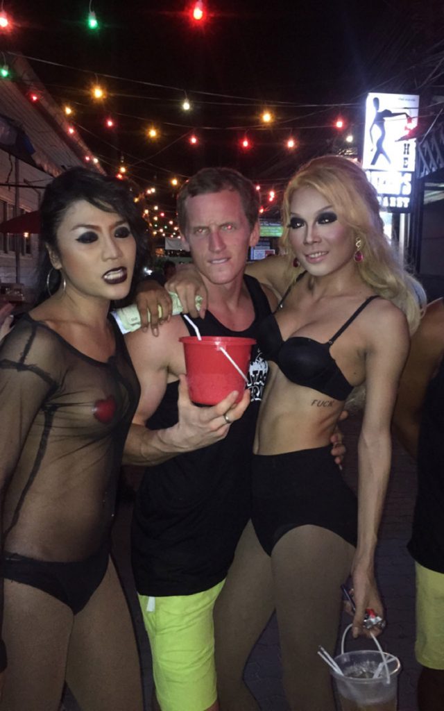 David Simpson with two ladyboys in Koh Tao, Thailand. Ladyboys, falling off balconies and falling downstairs