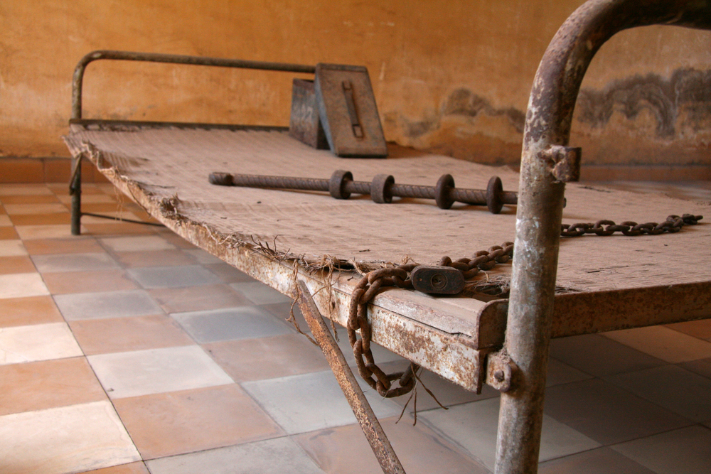 S21 Prison bed in Phnom Penh in Cambodia. The killing fields, grenades and free beer