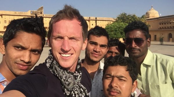David Simpson with the locals in Jaipur, India. Snake charming in Jaipur
