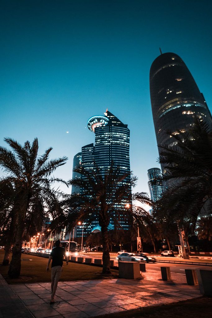 David Simpson among skyscrapers at night at West Bay in Doha, Qatar. The best cityscape in the world