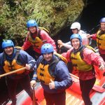 White water rafting in River valley in NZ. White water rafting and games at River valley