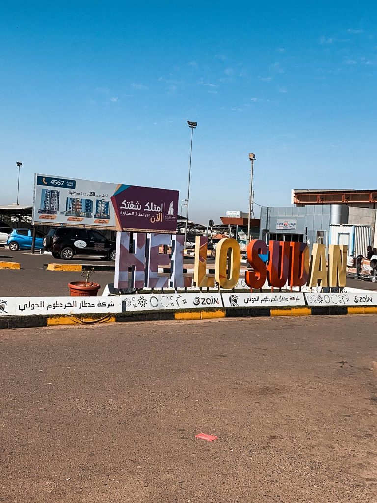 Hello Sudan sign in Sudan. Getting caught up in a protest in Sudan