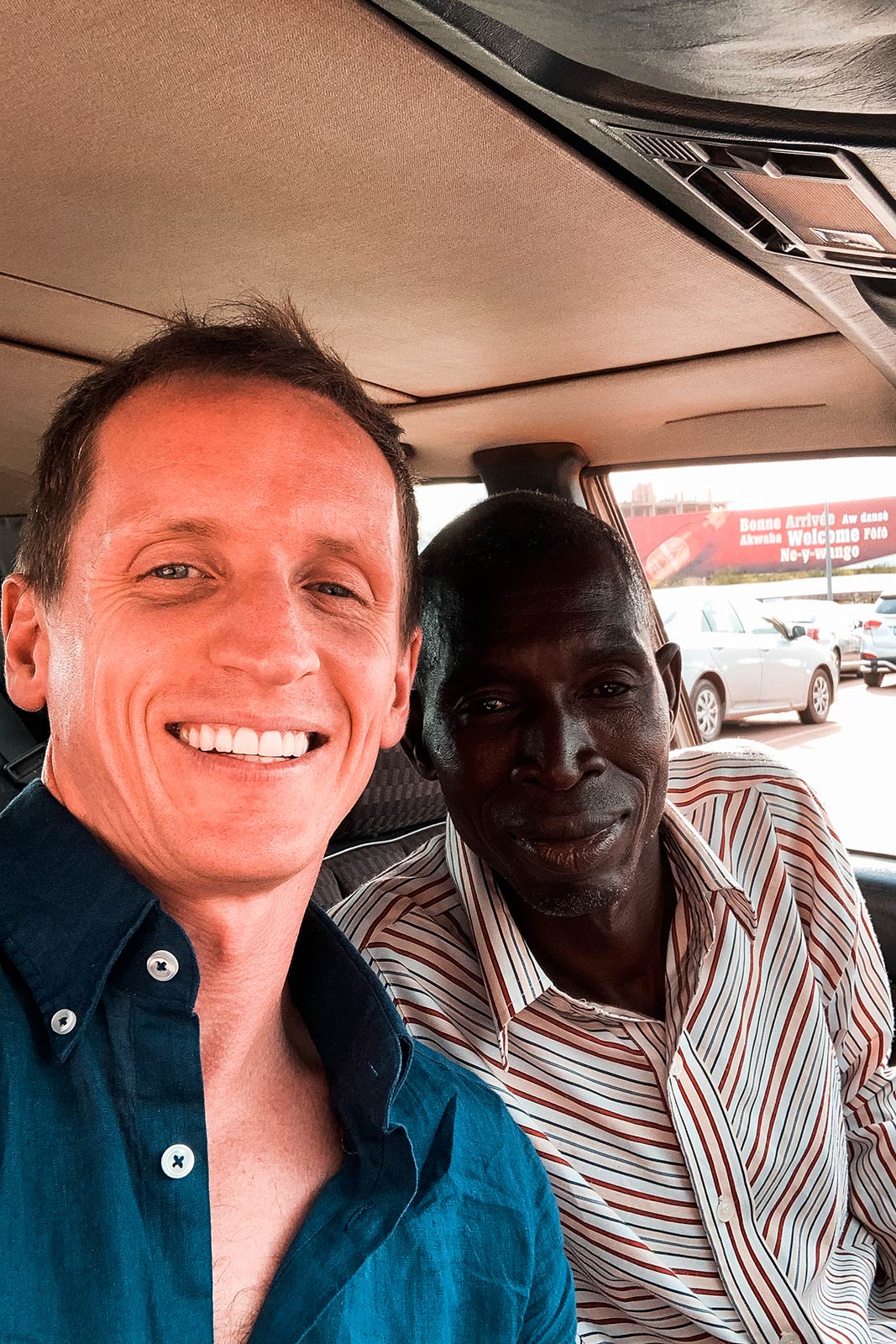 David Simpson and taxi driver in Niger. Negotiating with taxi drivers in Niger