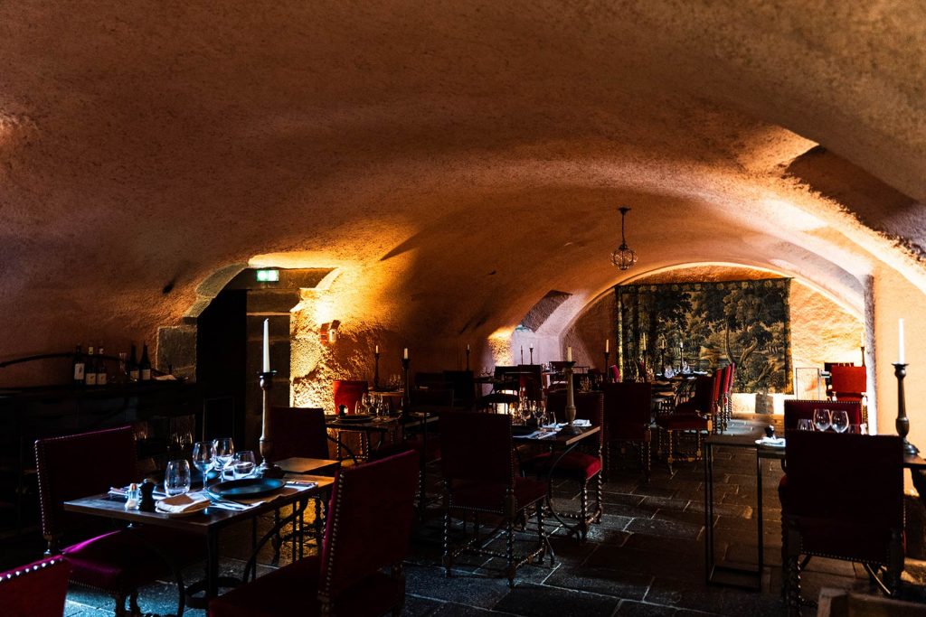 Dining in the dungeon at Chateau Varillettes in Lyon, France. The chateau of dreams