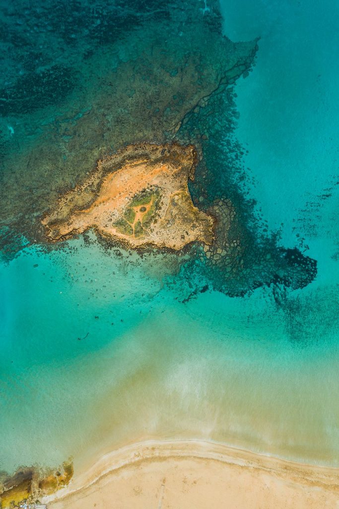 Aerial view of beach in Cyprus. The disputed series, reflection post