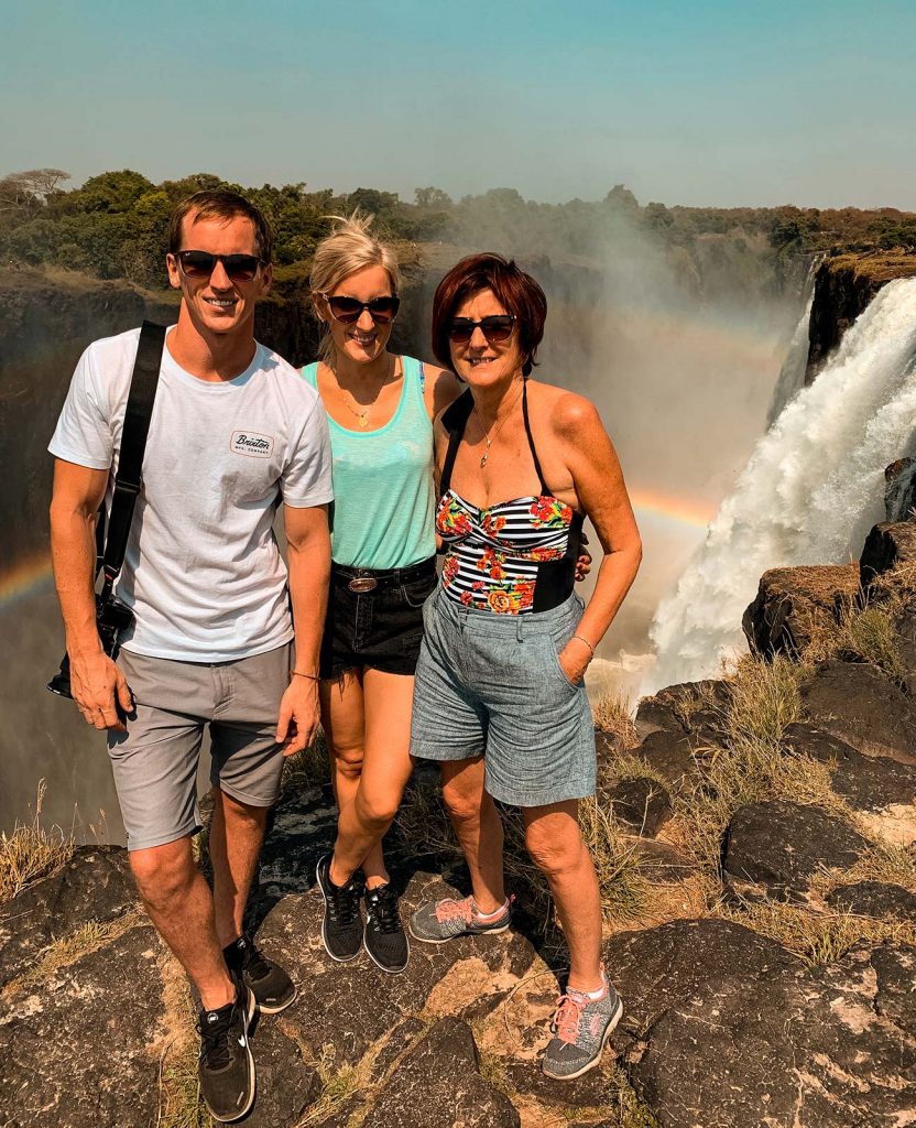 David Simpson and family at Victoria Falls in Zambia, Africa. The devil's pool