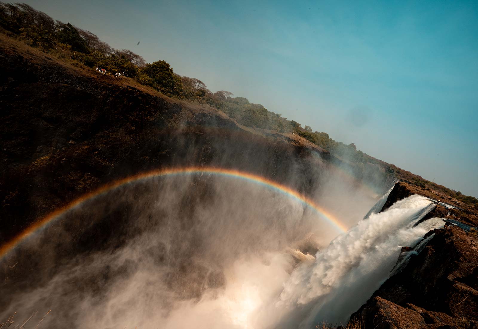 Rainbow at Victoria Falls in Zambia, Africa. The devil's pool