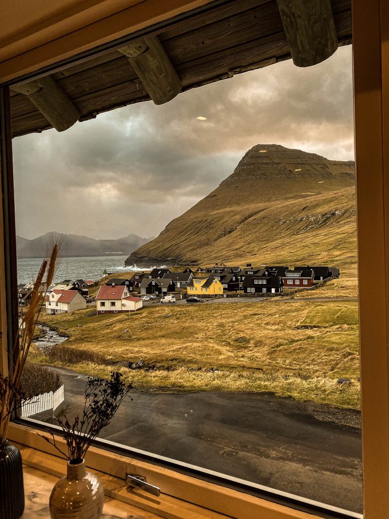 Window view at Gjaargardur Guesthouse in Faroe Islands. Getting blown off Mt Villingardalsfjall