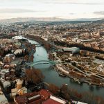 Birds eye view of the city of Tbilisi, Georgia. Wine at Georgian immigration