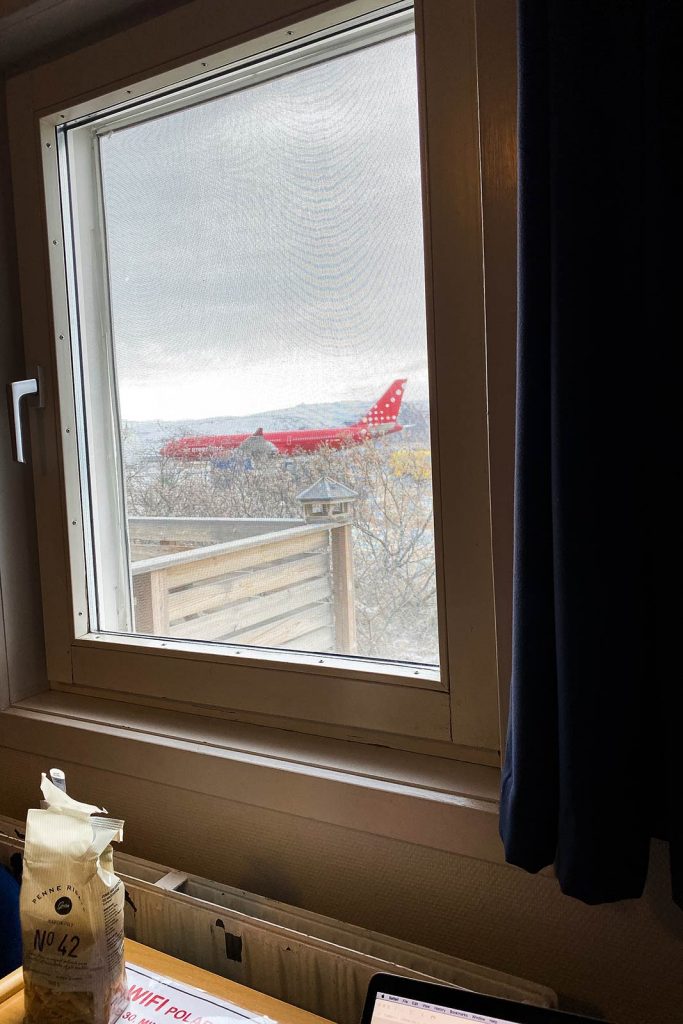 Plane outside the bedroom window in Greenland. The most scenic commercial flight in the world