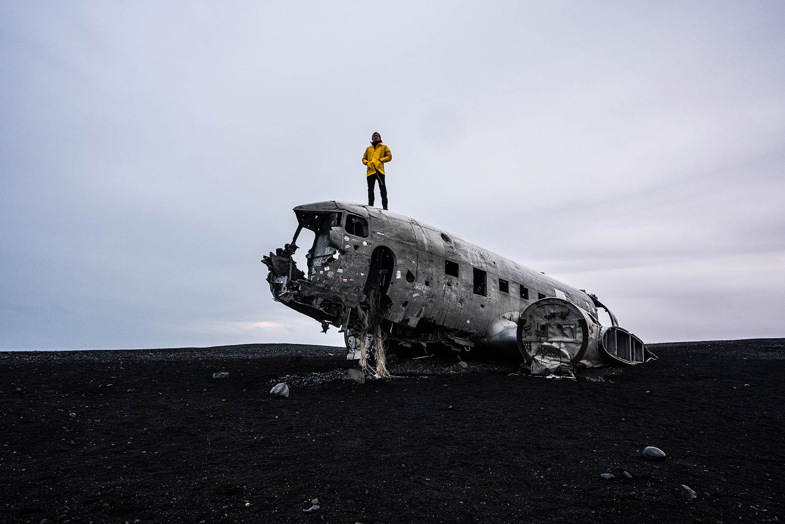 David Simpson on top of Sólheimasandur Plane Wreck in Iceland. From one paradise to another