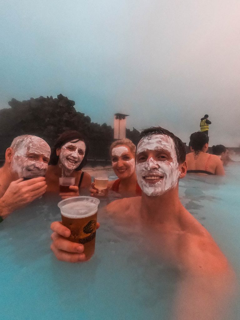 David Simpson and family wearing mud masks at Blue Lagoon in Grindavík, Iceland. The Blue Lagoon, Iceland