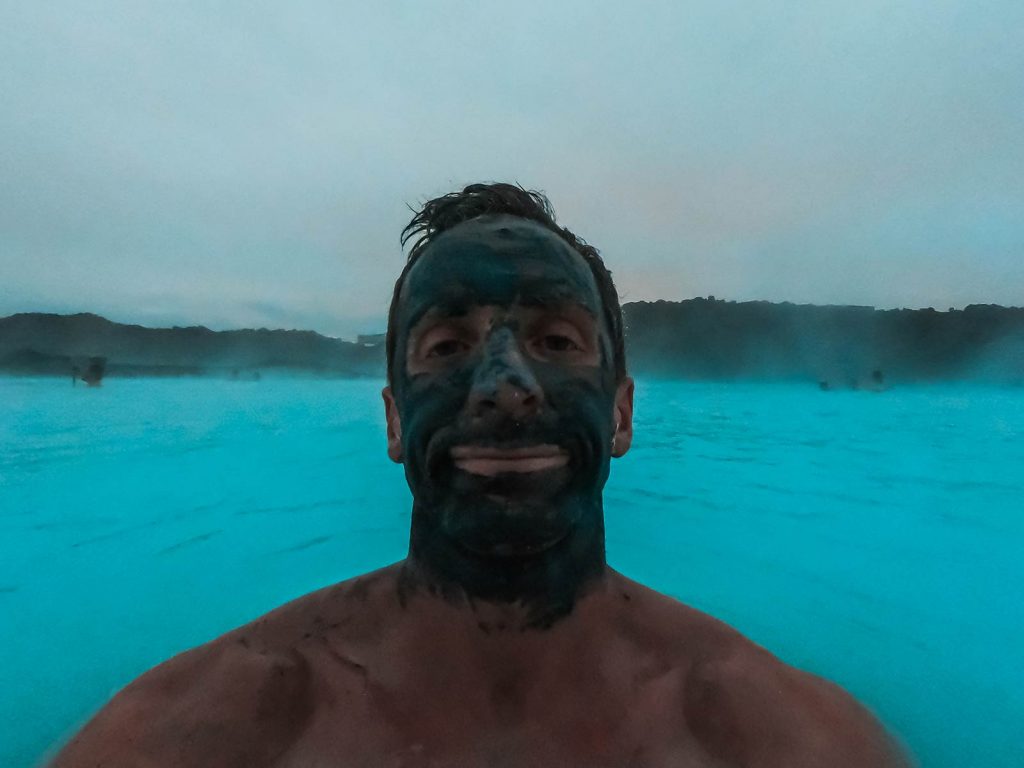 David Simpson wearing mud mask at Blue Lagoon in Grindavík, Iceland. The Blue Lagoon, Iceland