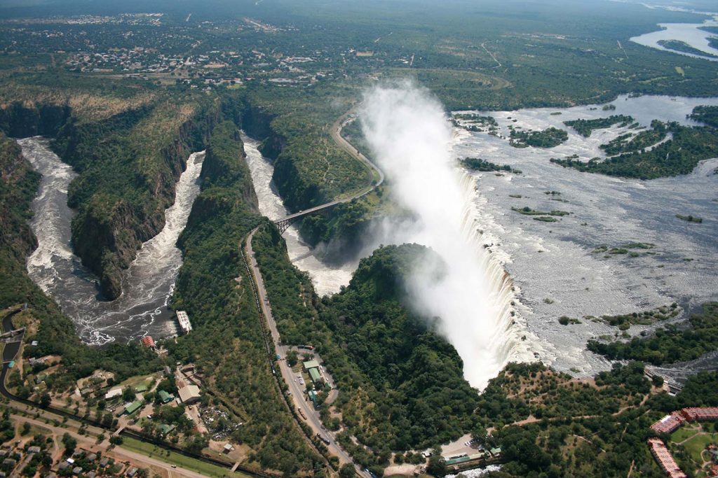Birds eye view of Victoria Falls in Zambia, Africa. A bungee and a microlight over Victoria Falls