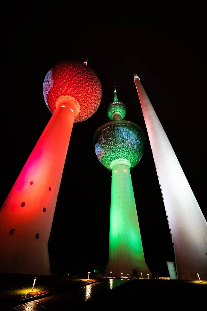 Night outside Kuwait Towers in Kuwait. The oil series, reflection post