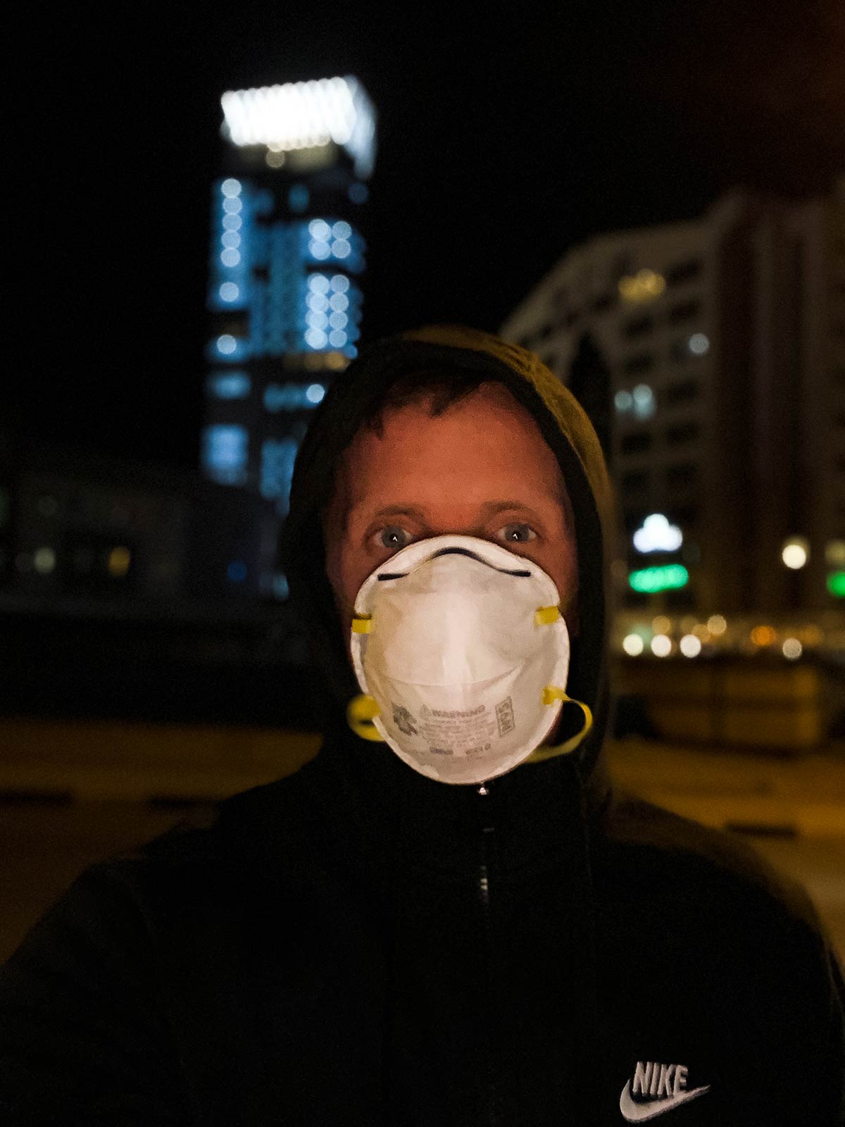 David Simpson wearing mask at night in Kuwait. 2020 - A silver lining
