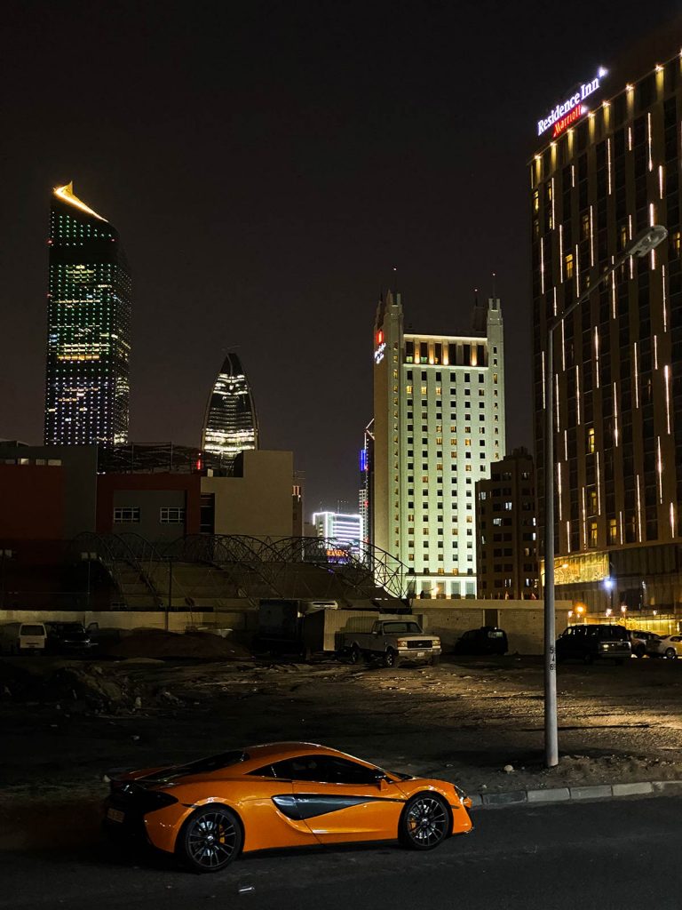 Parked cars and buildings at night in Kuwait. The most insane waterfight in the world
