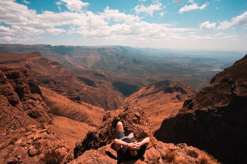 David Simpson enjoying the view on top of the Ampitheater in Lesotho, Africa. The greatest hike on Earth?