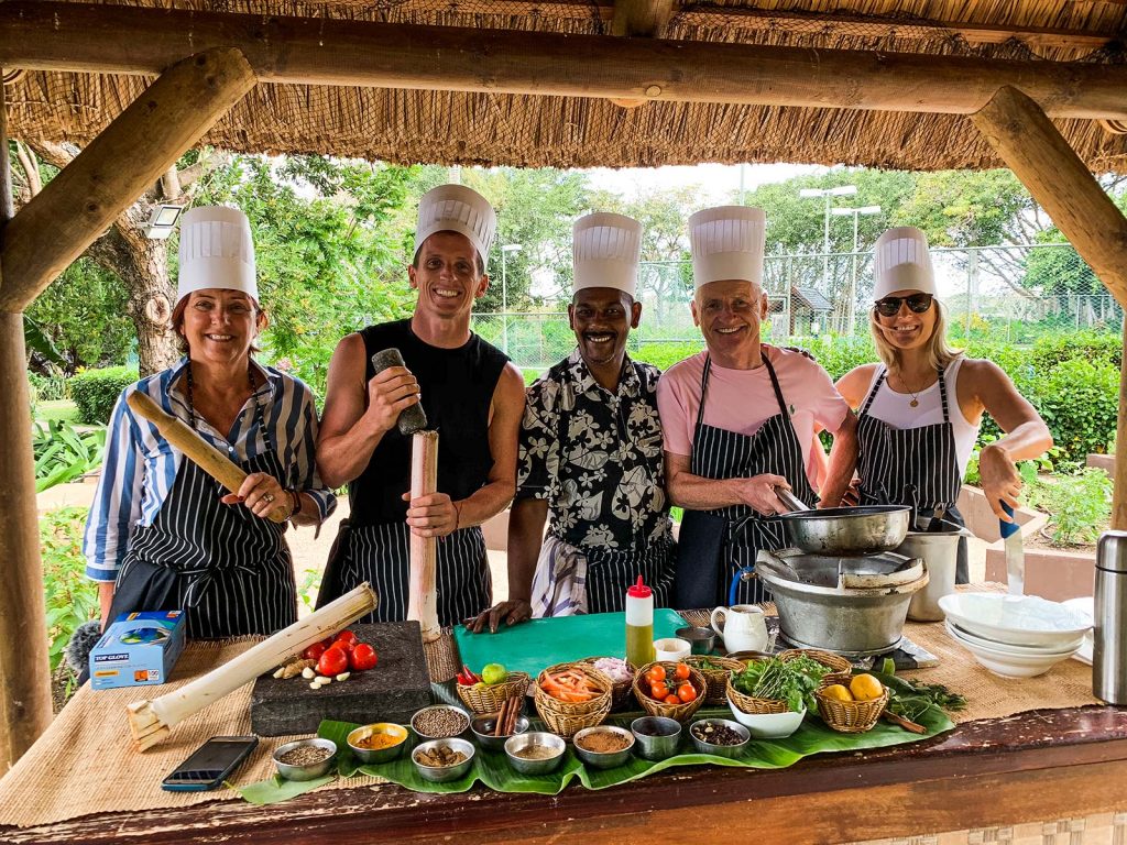 David Simpson and family attending cookery school in Mauritius, Africa. Mauritian cookery class