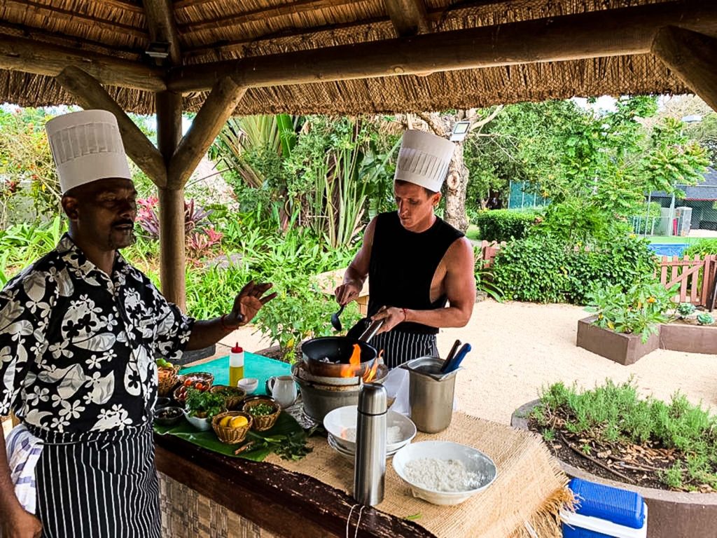 David Simpson attending cookery school in Mauritius, Africa. Mauritian cookery class
