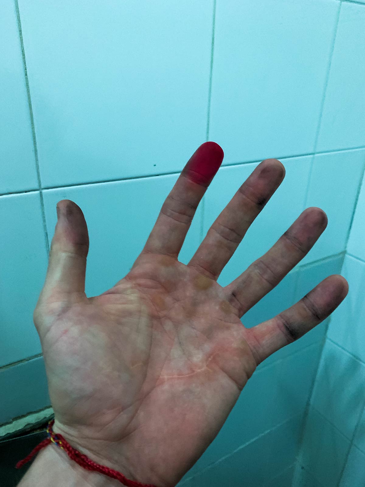Dirty right hand after finger printing in Algiers, Algeria. 5 hours in an Algerian police station