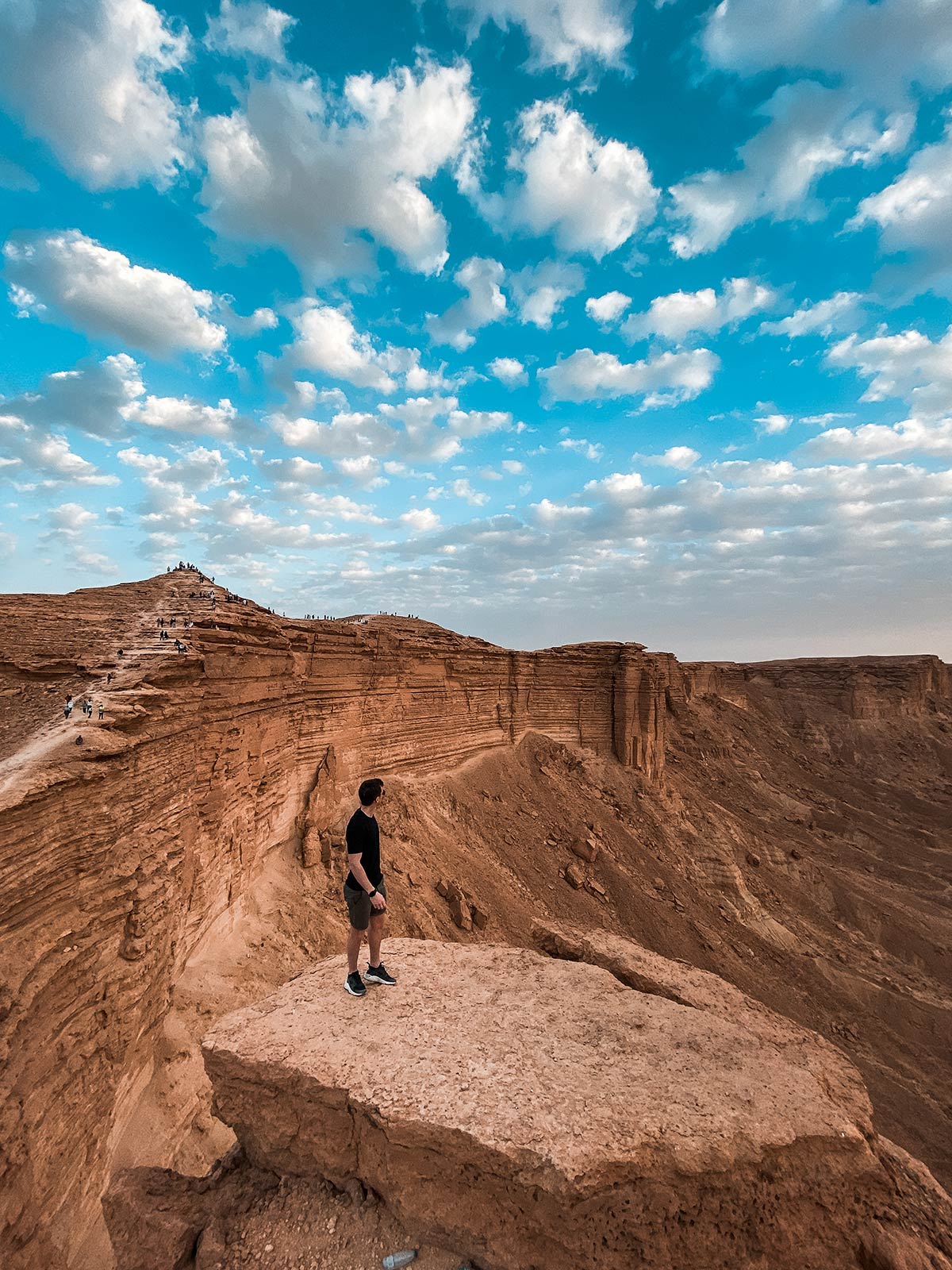 David Simpson in amphitheater in Saudi Arabia. A trip to the edge of the world
