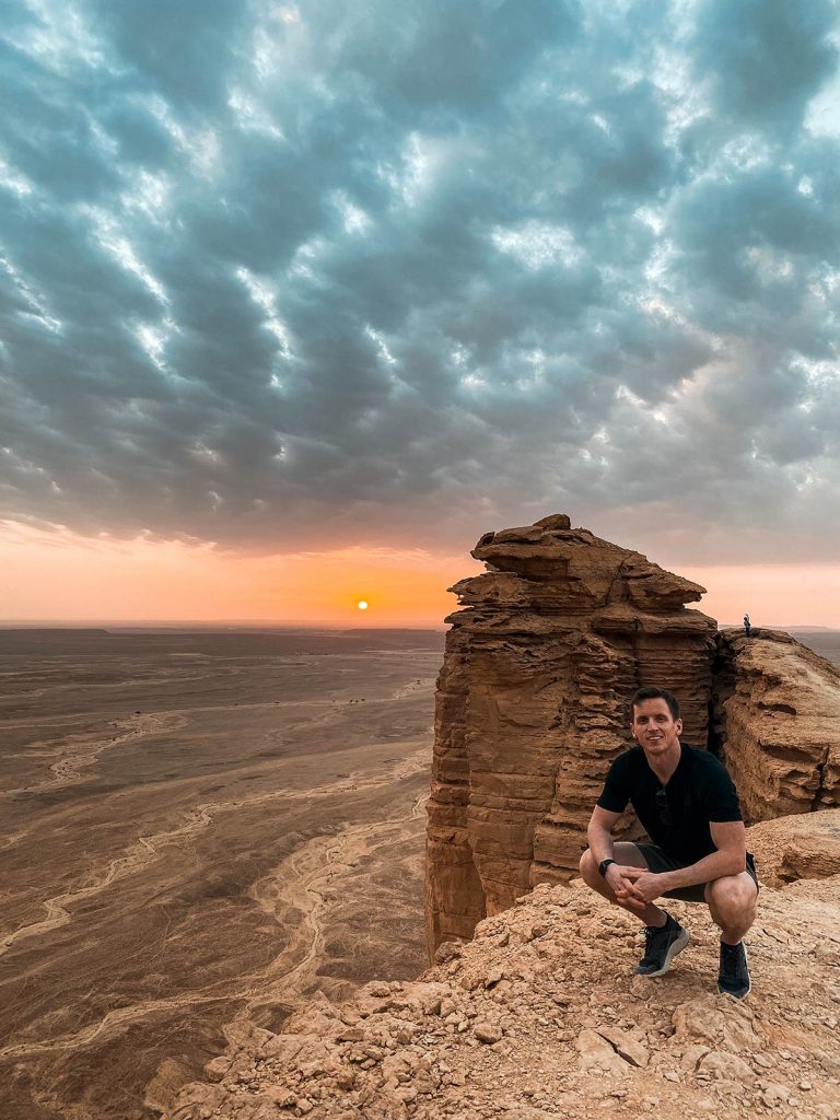 David Simpson at amphitheater during sunset in Saudi Arabia. A trip to the edge of the world
