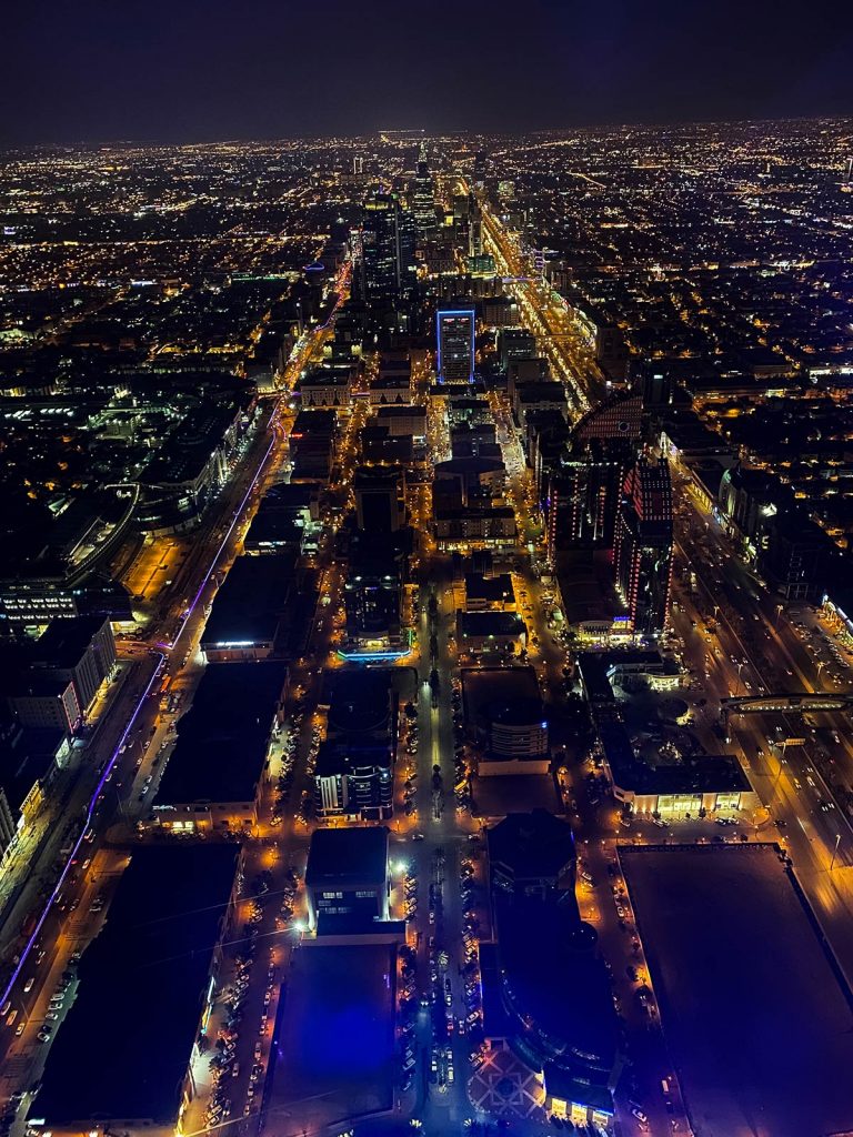 Aerial view at night of Riyadh, Saudi Arabia. Chop Chop Square