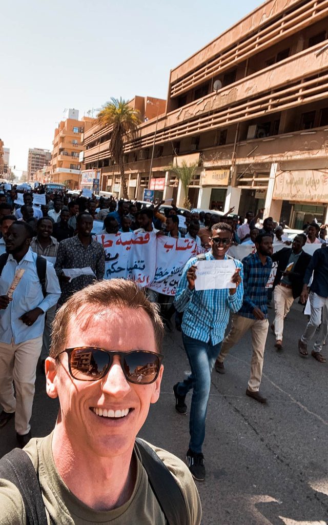 David Simpson and street protesters in Sudan. Getting caught up in a protest in Sudan