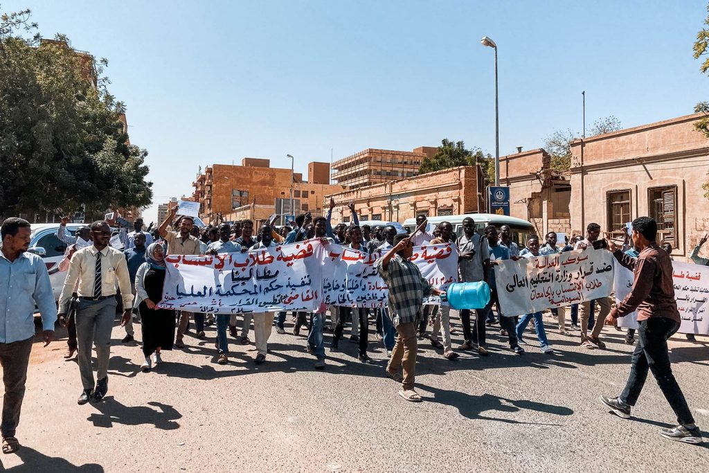 Protesters walking the streets in Sudan. Getting caught up in a protest in Sudan