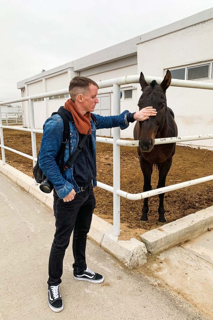 David Simpson with horse in Ashgabat, Turkmenistan. A day in Ashgabat