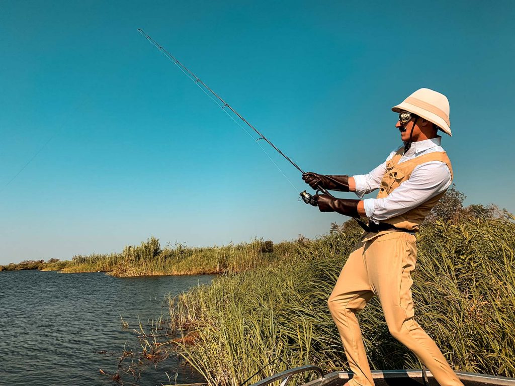 David Simpson fishing at Zambezi River in Namibia, Africa. Kasenu Village, Namibia