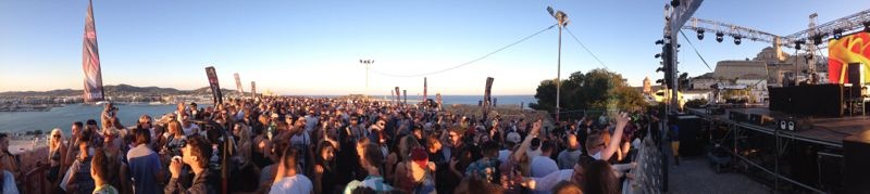 Party people at beach in Ibiza, Spain. The greatest party venue in the world