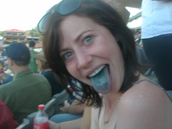 Girl with blue tongue in Calgary. Calgary stampede