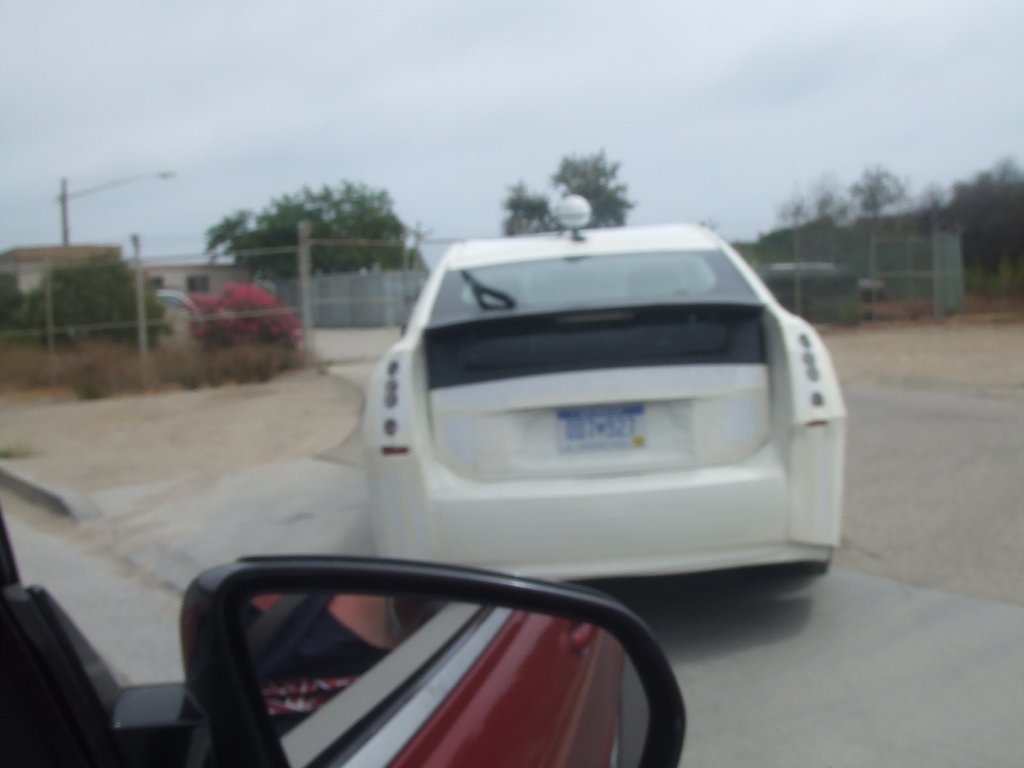 Back of a white car in California. California roadtrip