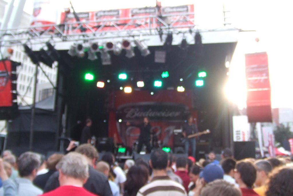 A band performing onstage for the crowd in Montreal. F1 in Montreal