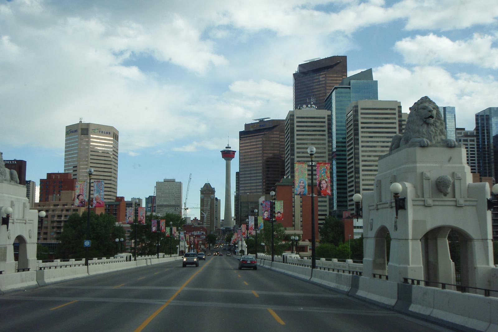 Freeway and buildings in Calgary. Cowboys in Calgary