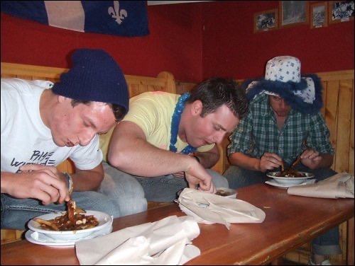 Three guys eating in Banff. Three weeks in Banff