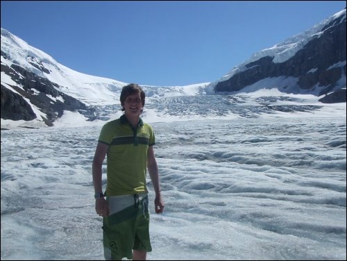 David Simpson in snowy mountain backdrop in Banff. Three weeks in Banff