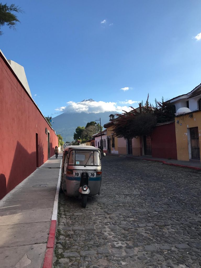 Tuk-tuk at cobblestone street in Antigua, Guatemala. Volcanic diarrhea in Antigua