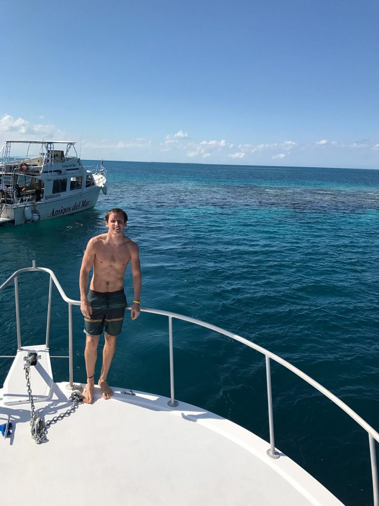 David Simpson on a boat in Belize, Central America. Diving the Great Blue Hole