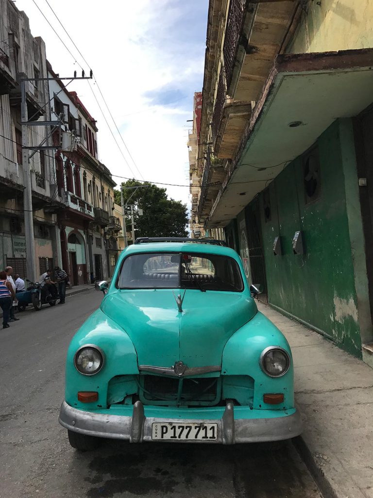 A vintage car in the street in Havana, Cuba. Cigars, cars & cocktails in Cuba