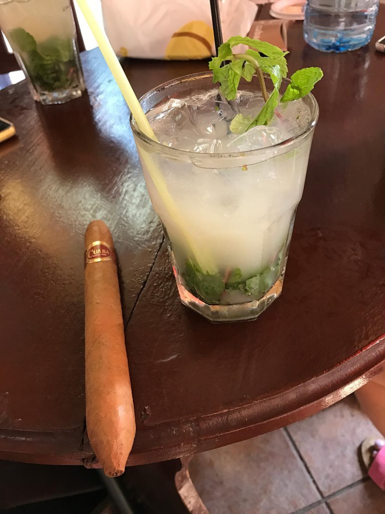 Cigar and drink in Havana, Cuba. Cigars, cars & cocktails in Cuba