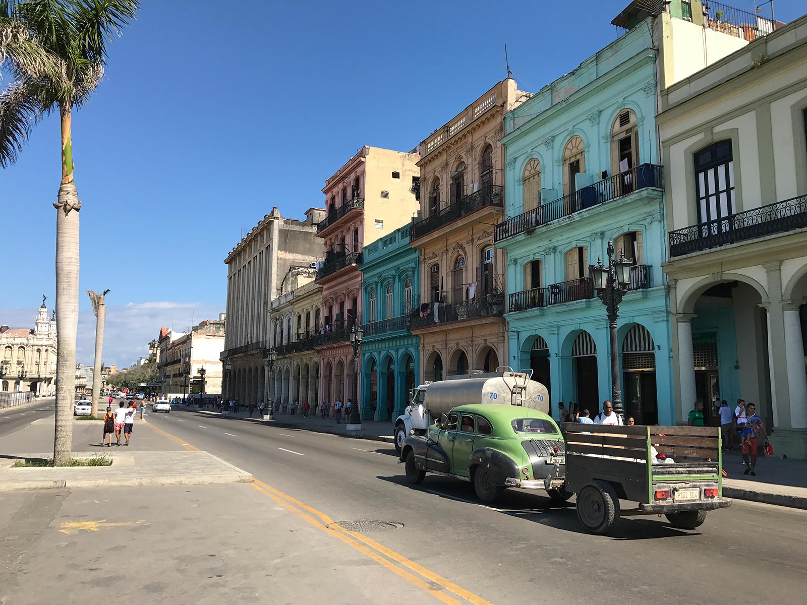 Vintage cars and buildings in Havana, Cuba. Cigars, cars & cocktails in Cuba