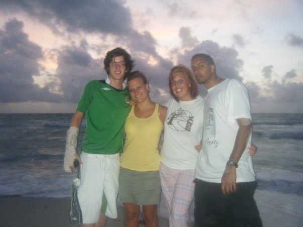 David Simpson with a guy and two girls in Miami. Miami's sinking ship